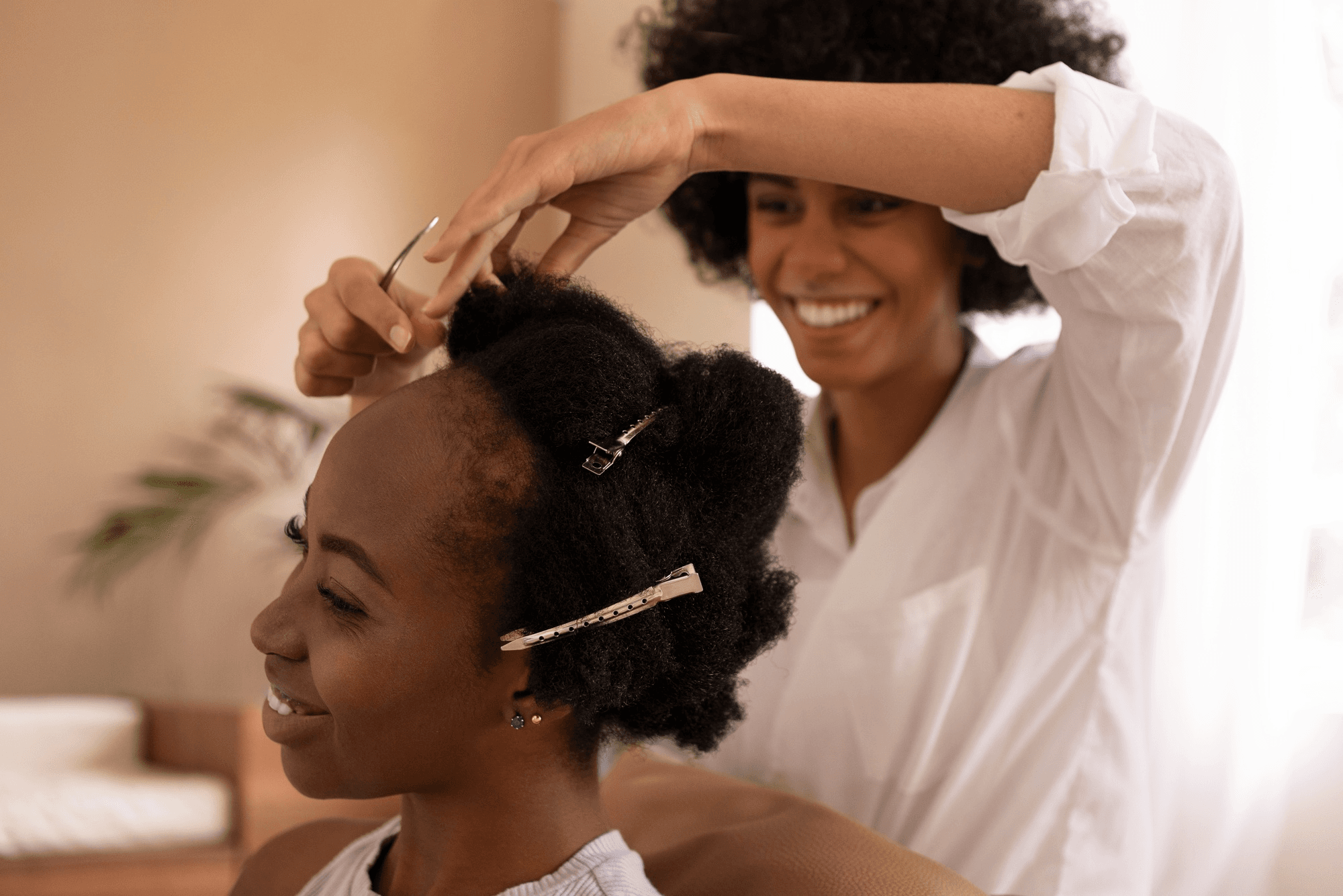 Stylist working on a client’s hair